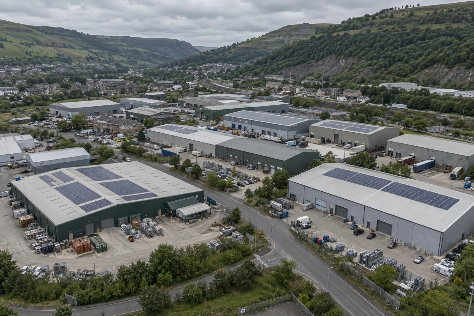 South Wales valley industrial estate with solar arrays on several unit roofs